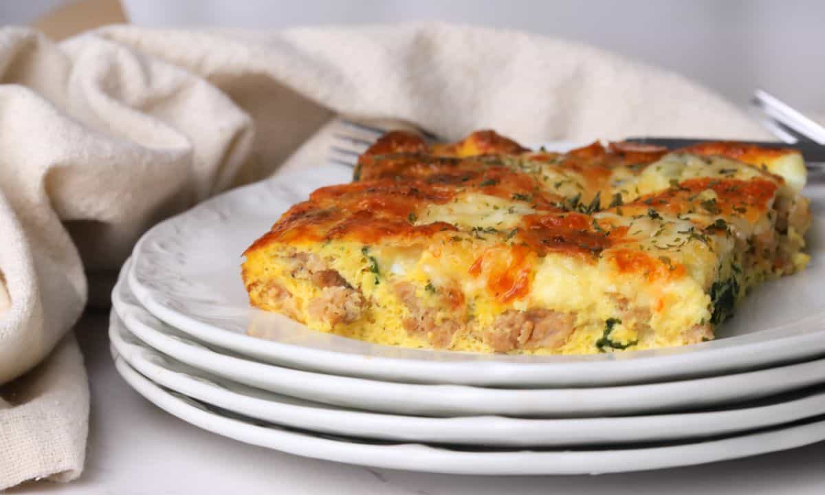 Very closeup of the frittata slice on a plate.