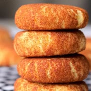 Low carb sugar free snickerdoodle cookies stacked on top of each other.