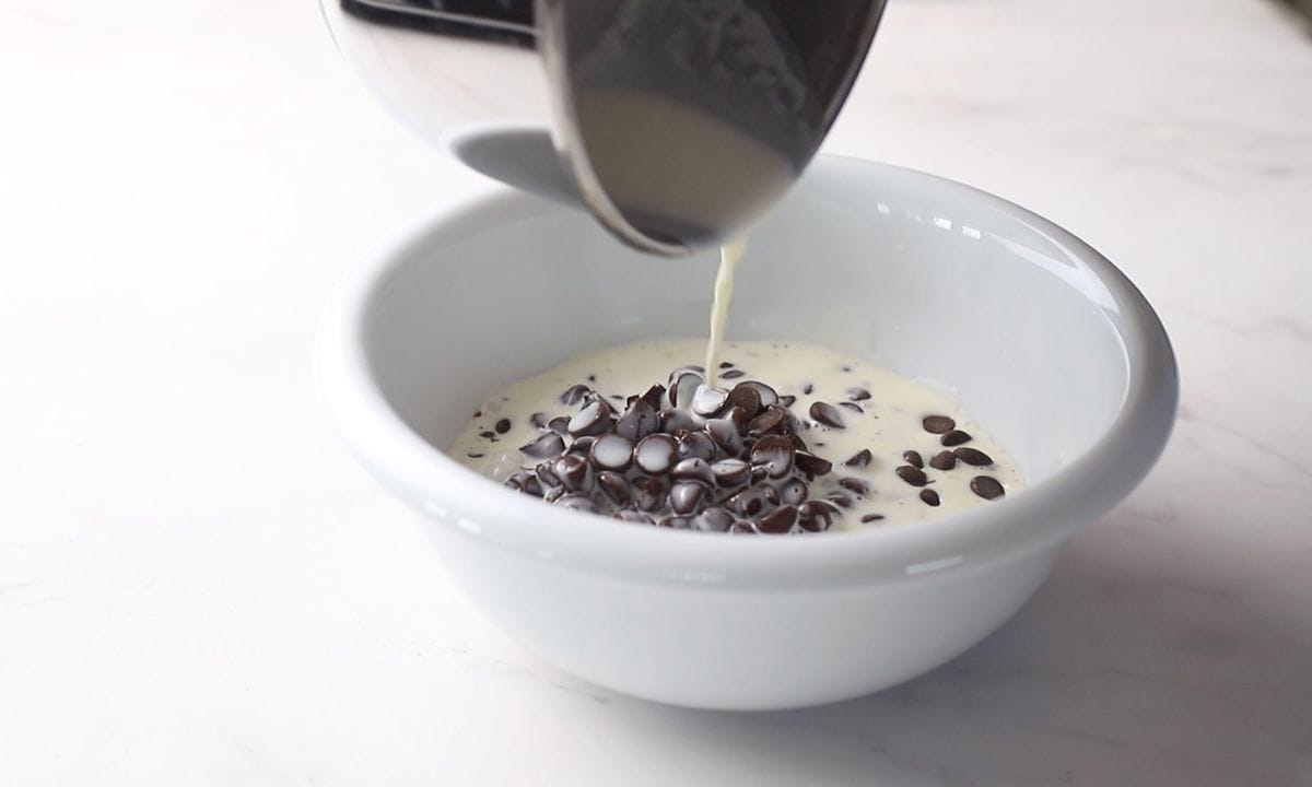 Pouring the cream over the sugar free chocolate chips.