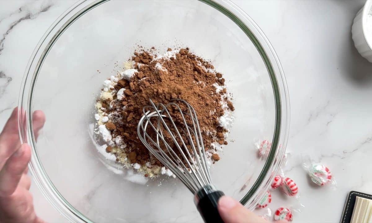 Whisking the dry ingredients in a large bowl.