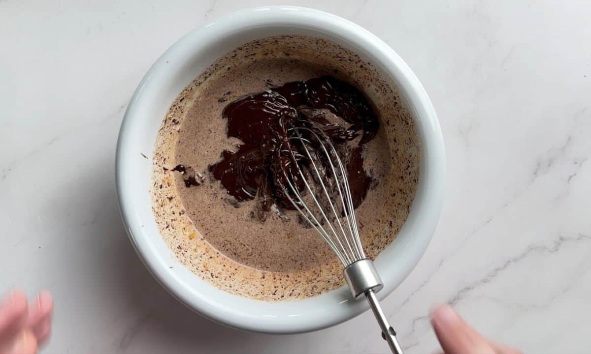 Whisking the chocolate and cream.