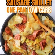 Cabbage and sausage in a skillet.