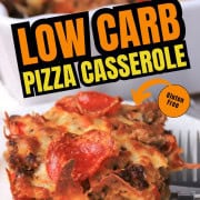 Low carb pizza casserole slice on a plate with the casserole in the background.