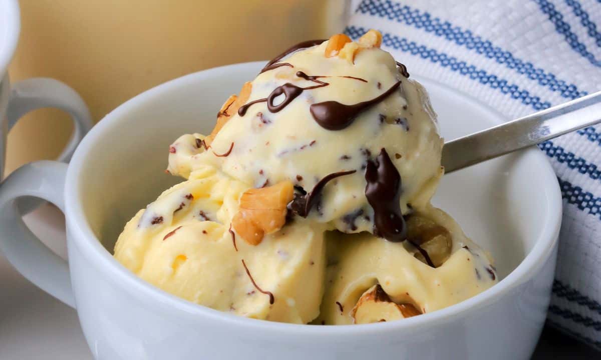 High protein chunky monkey ice cream in a white bowl.