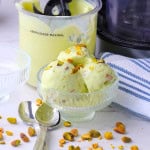High protein sugar free pistacio ice cream made in the ninja creami in a bowl and in the creami pint.