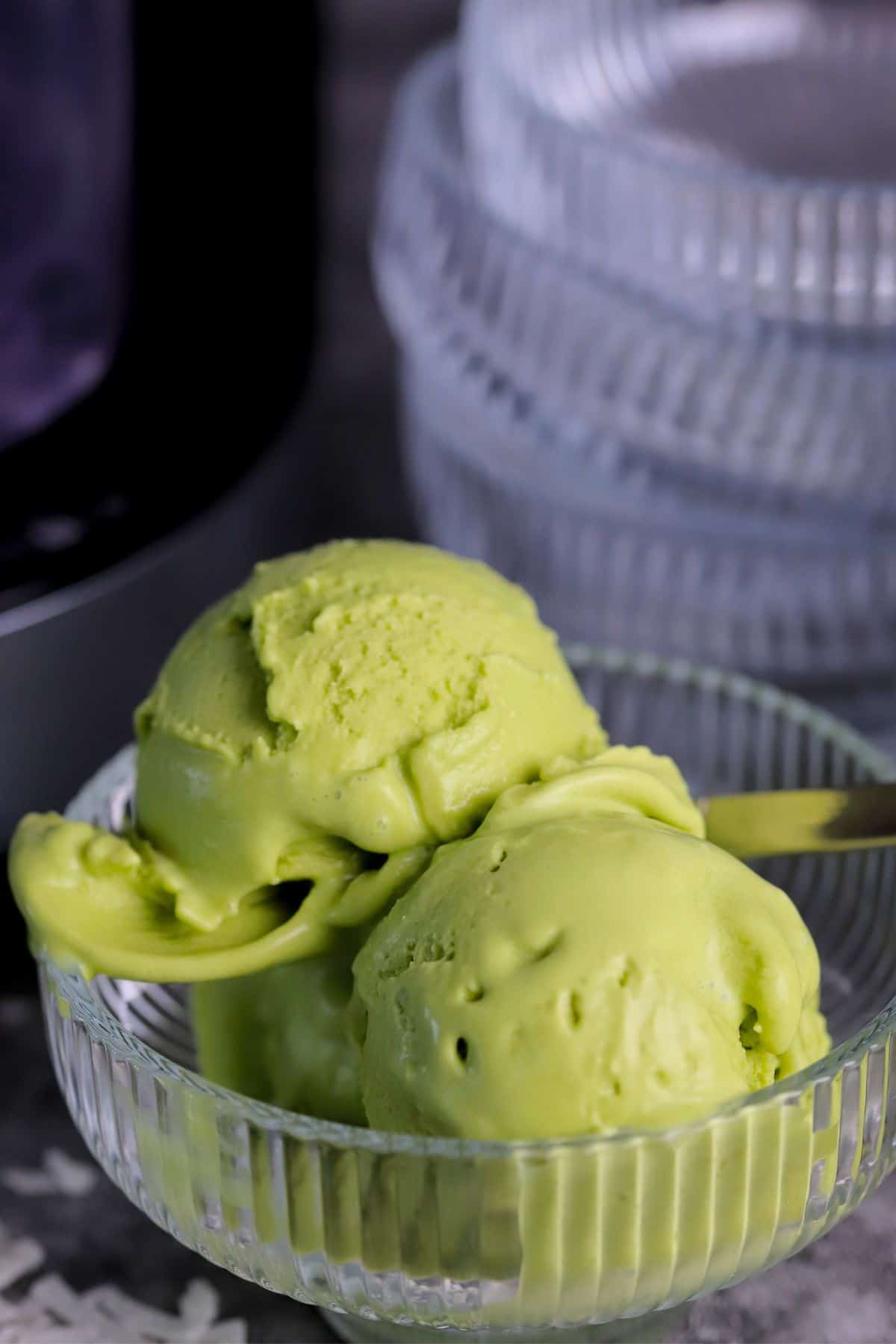 Bowl of vegan coconut match ice cream made in the ninja creami.