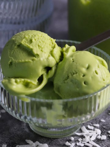 Bowl of vegan coconut match ice cream made in the ninja creami.