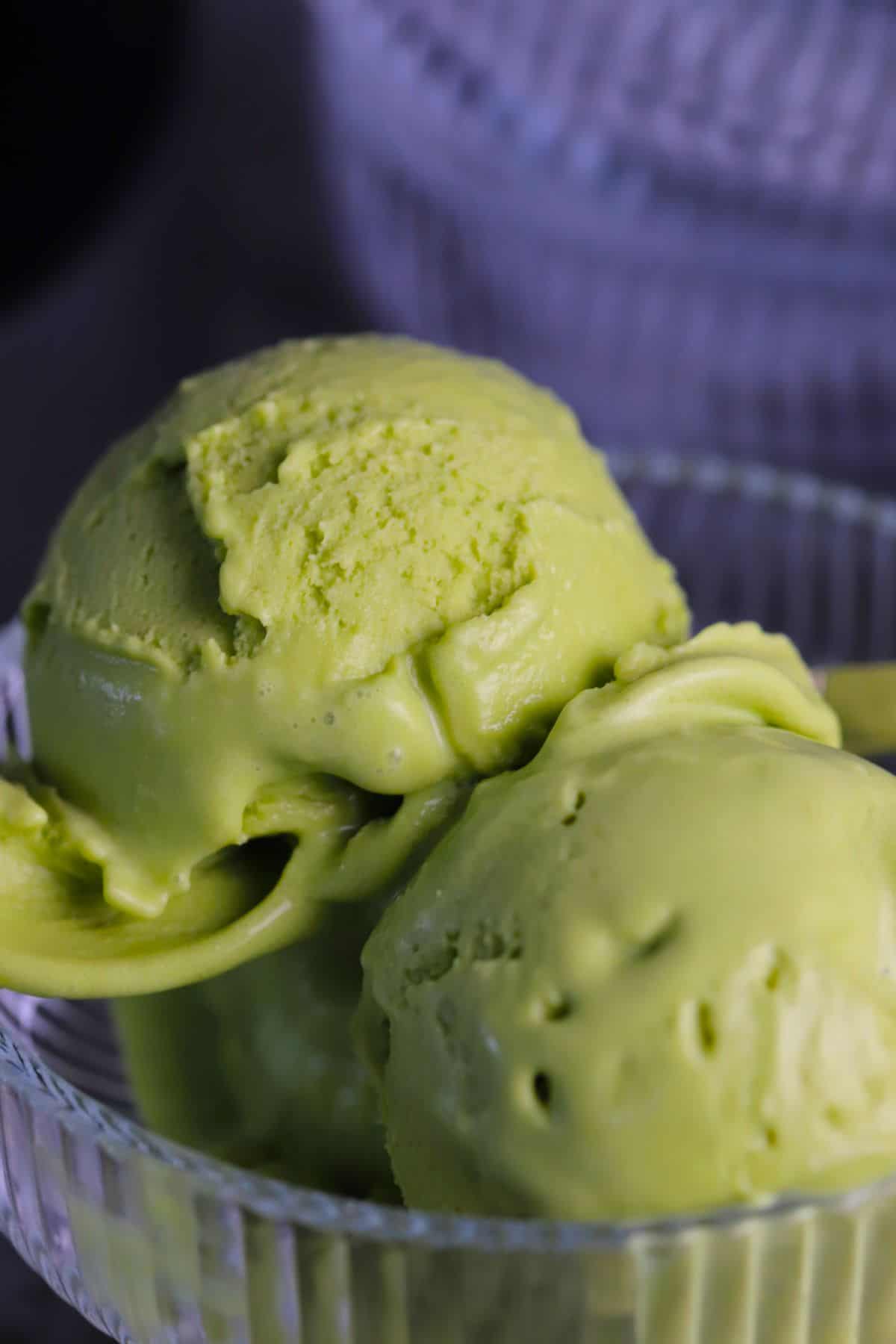 Bowl of vegan coconut match ice cream made in the ninja creami.