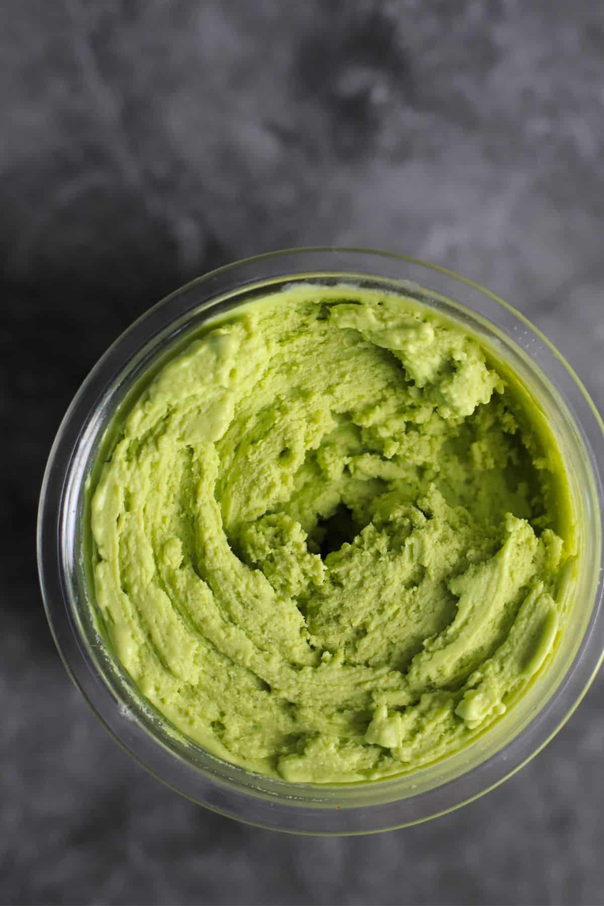 Pint of vegan coconut match ice cream made in the ninja creami.