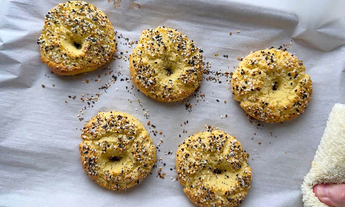 Baked high protein cottage cheese low carb bagels on a baking sheet.