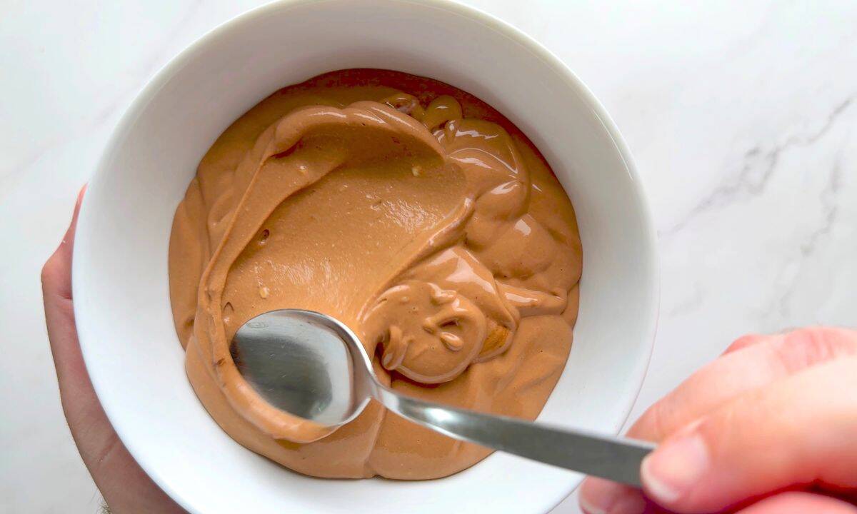 Chocolate mousse in a white bowl.