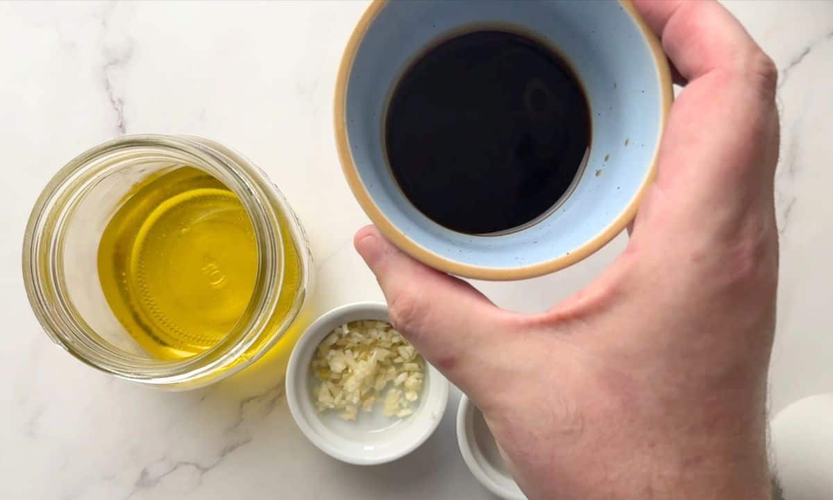 Making the dressing for the salad.