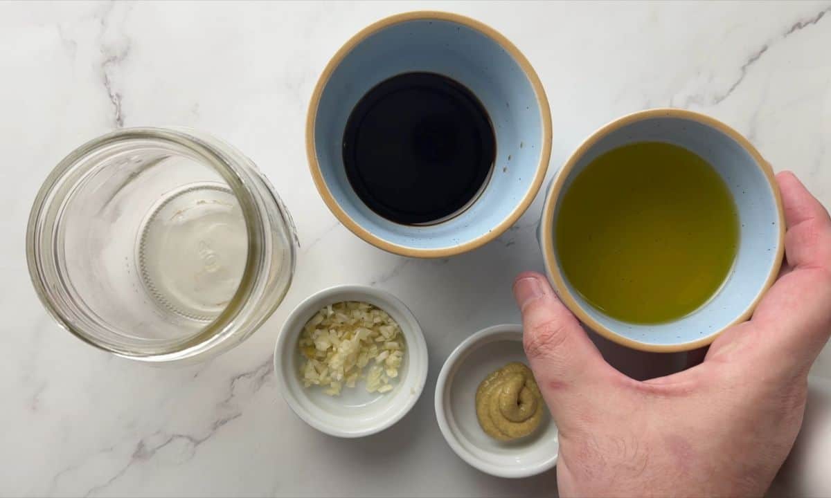 Making the salad dressing.