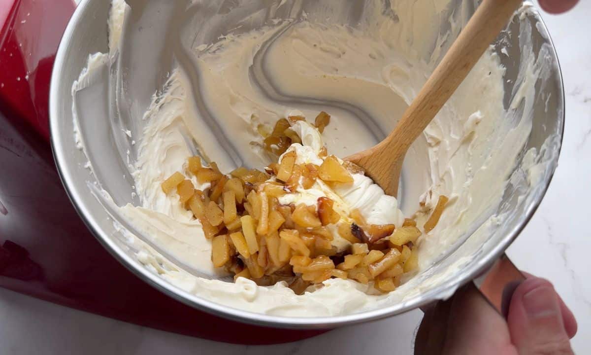 Diced apples in the cream cheese batter.