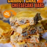 Cottage cheese carrot cake bars stacked on top of each other.