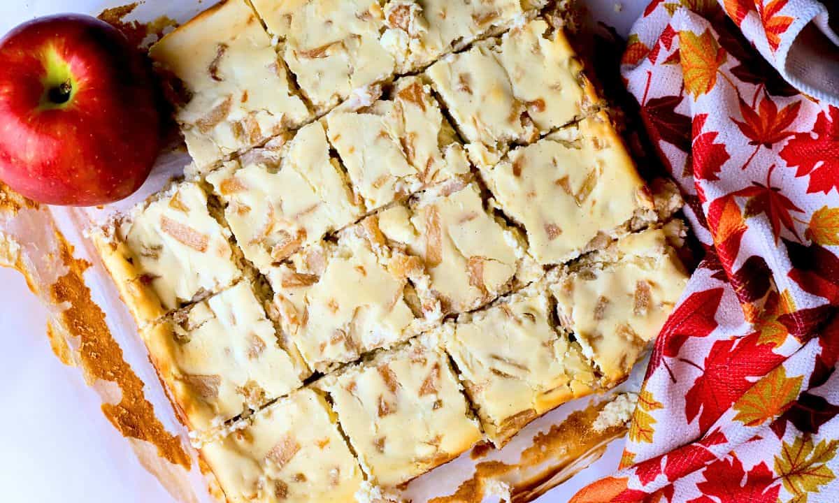 Low carb apple cheesecake bars cut into squares.