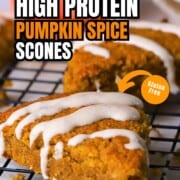Gluten Free High Protein Low carb pumpkin spice scones drizzled with a glaze on a cooling rack.