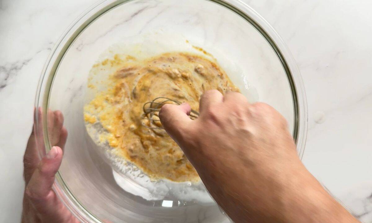 Mixing the wet ingredients.