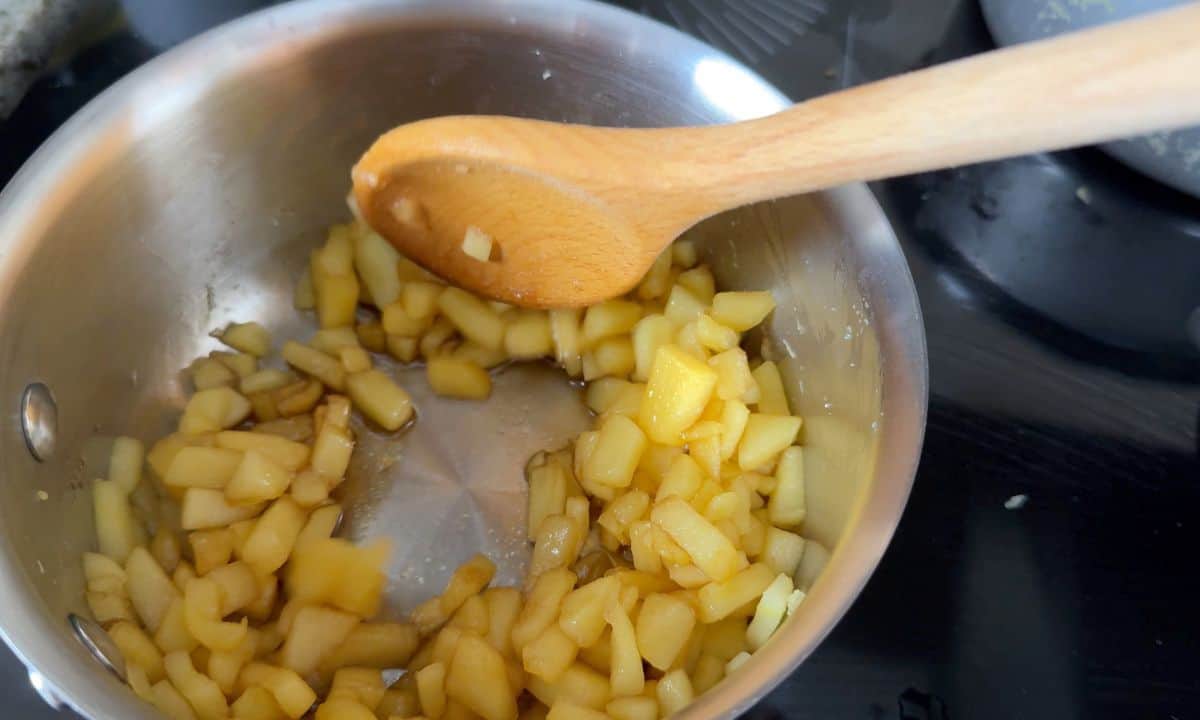 Diced apples in a saucepen.