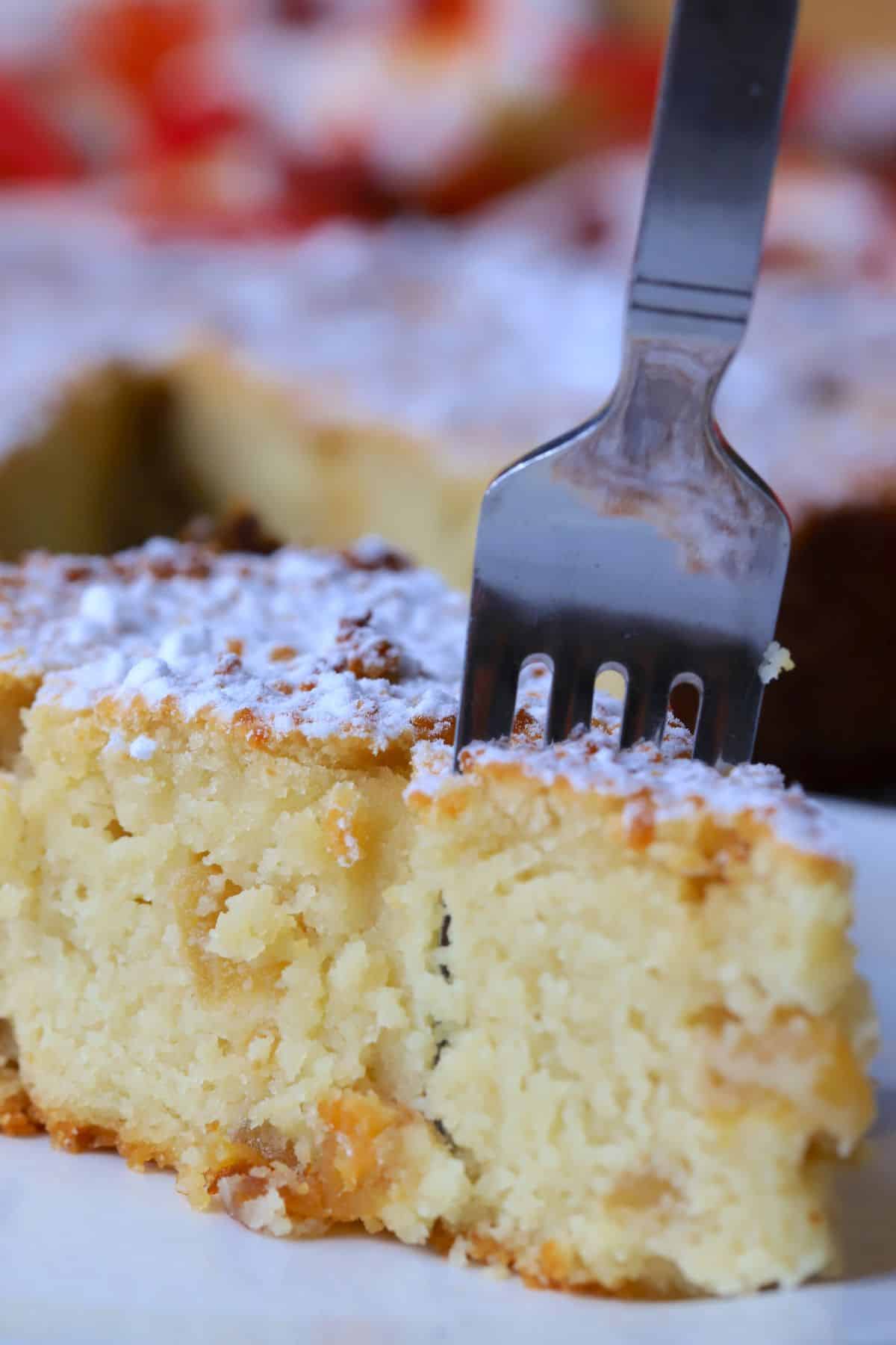 Low carb apple ricotta cake slice on a plate.