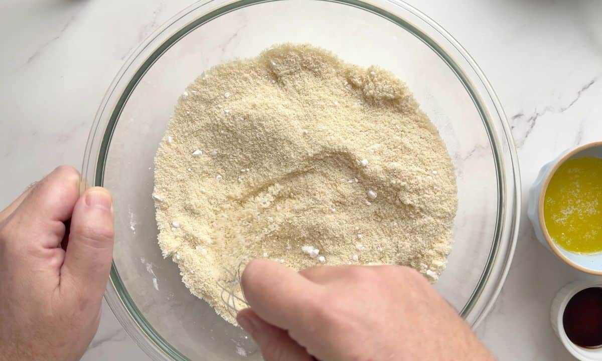 Mixing the dry ingredients in a bowl.