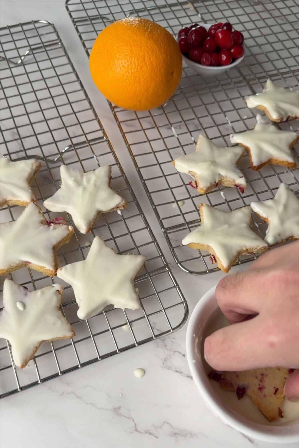 Dipping the cookies in the sugar free white chocolate.