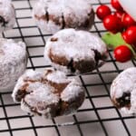 Close up of low carb chocolate crinkle cookies on a cooling rack.