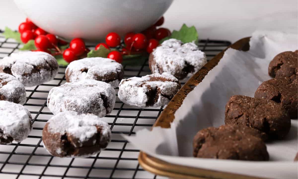 Close up of low carb chocolate crinkle cookies on a cooling rack.