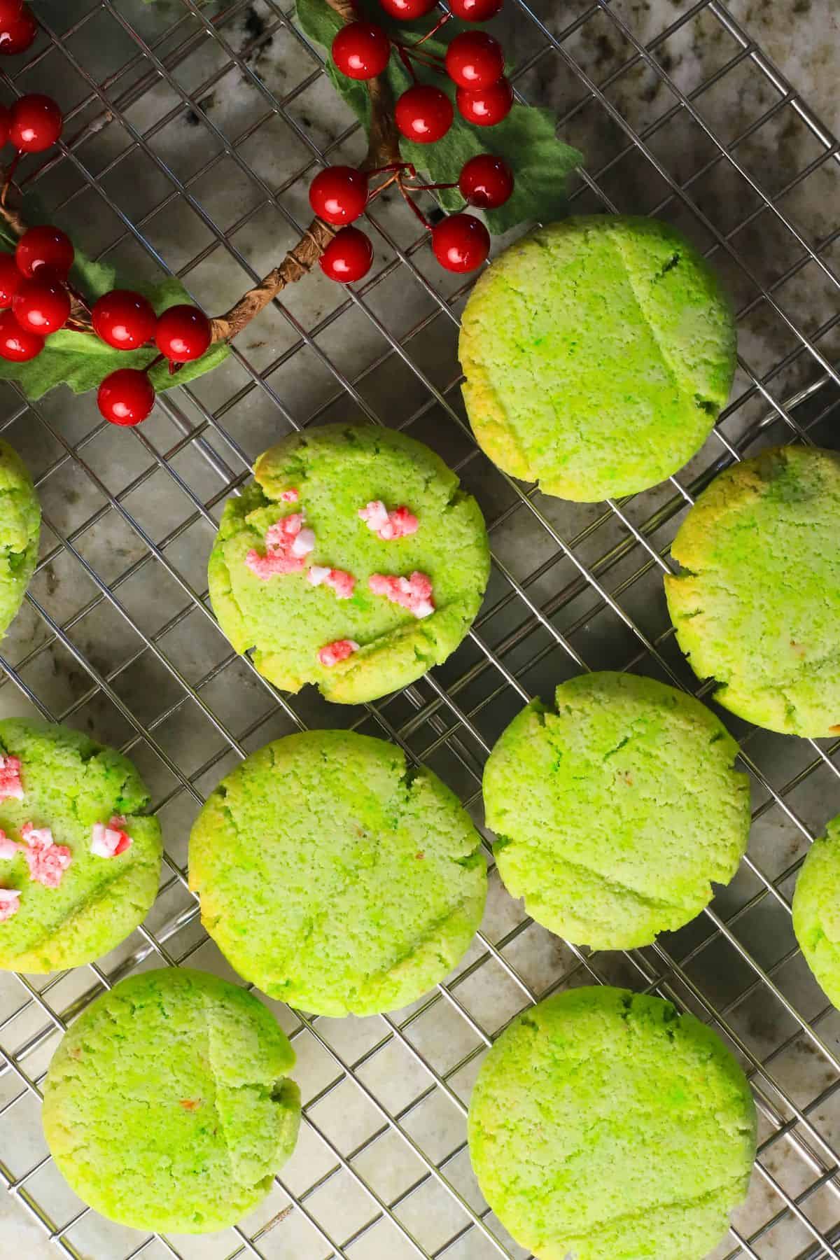 Low carb grinch cookies on a cooling rack.