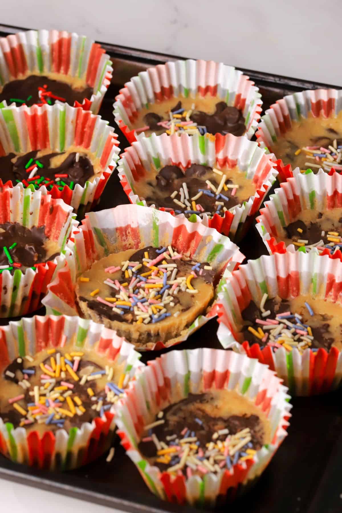 Low carb holiday pecan toffee bites on a tray.