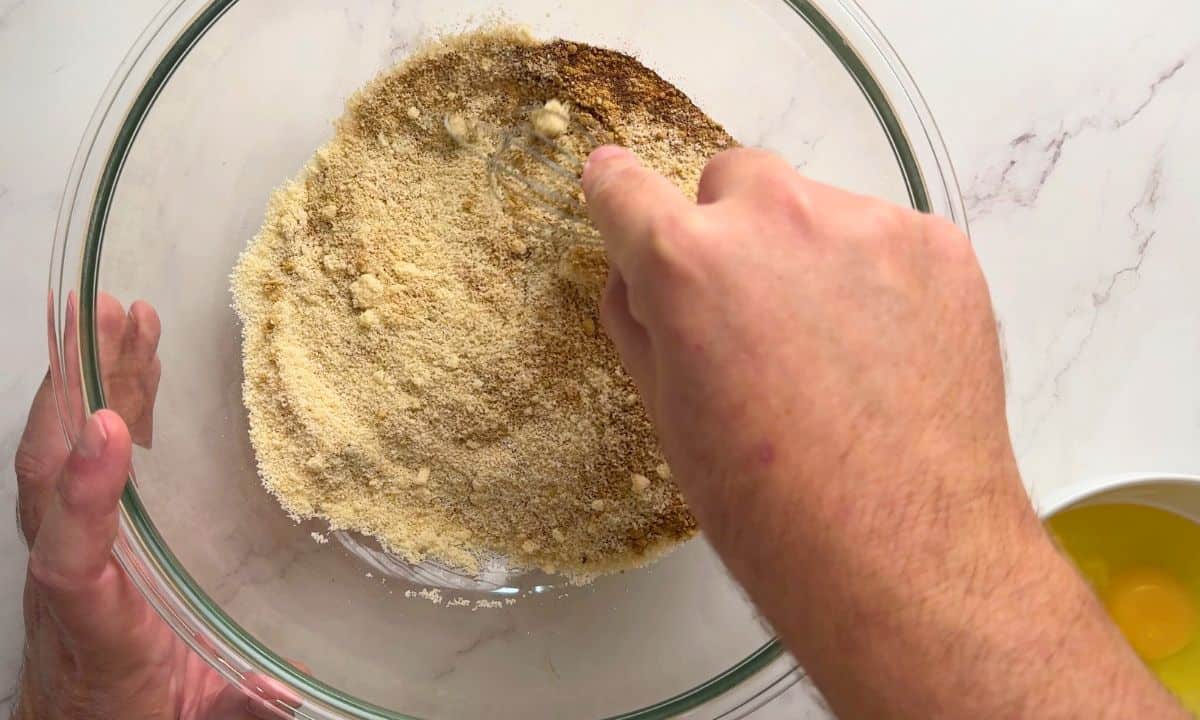 Mixing the dry ingredients for the gingerbread muffins.