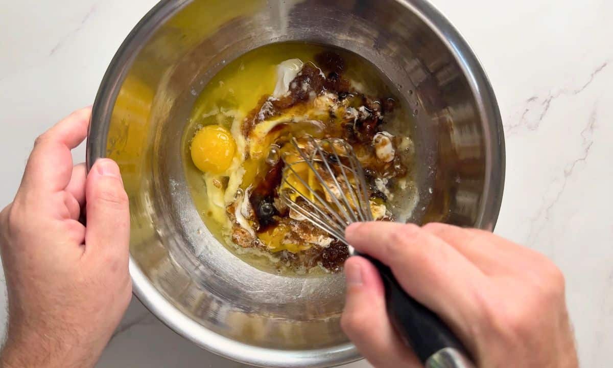 Mixing the wet ingredients for the gingerbread muffins.