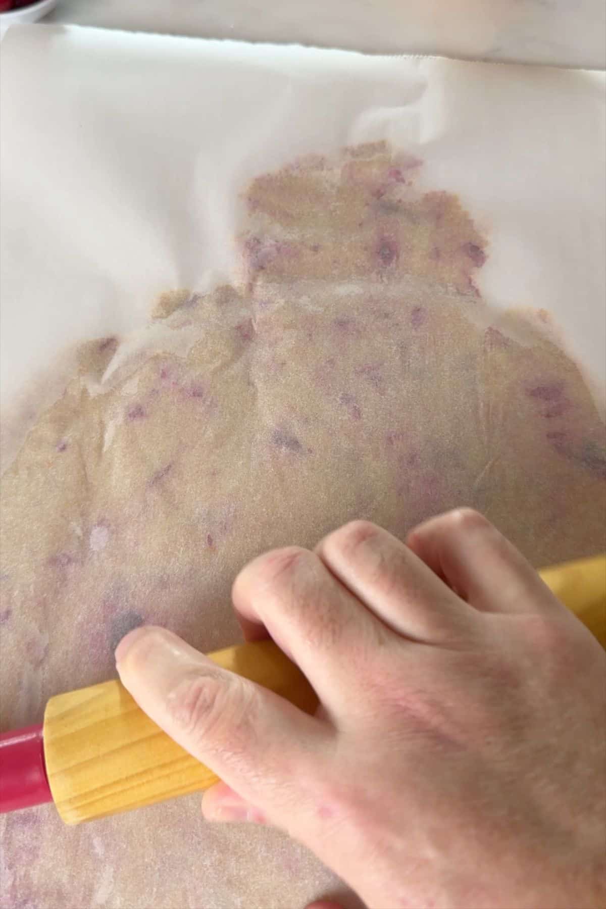 Rolling the cookie dough.