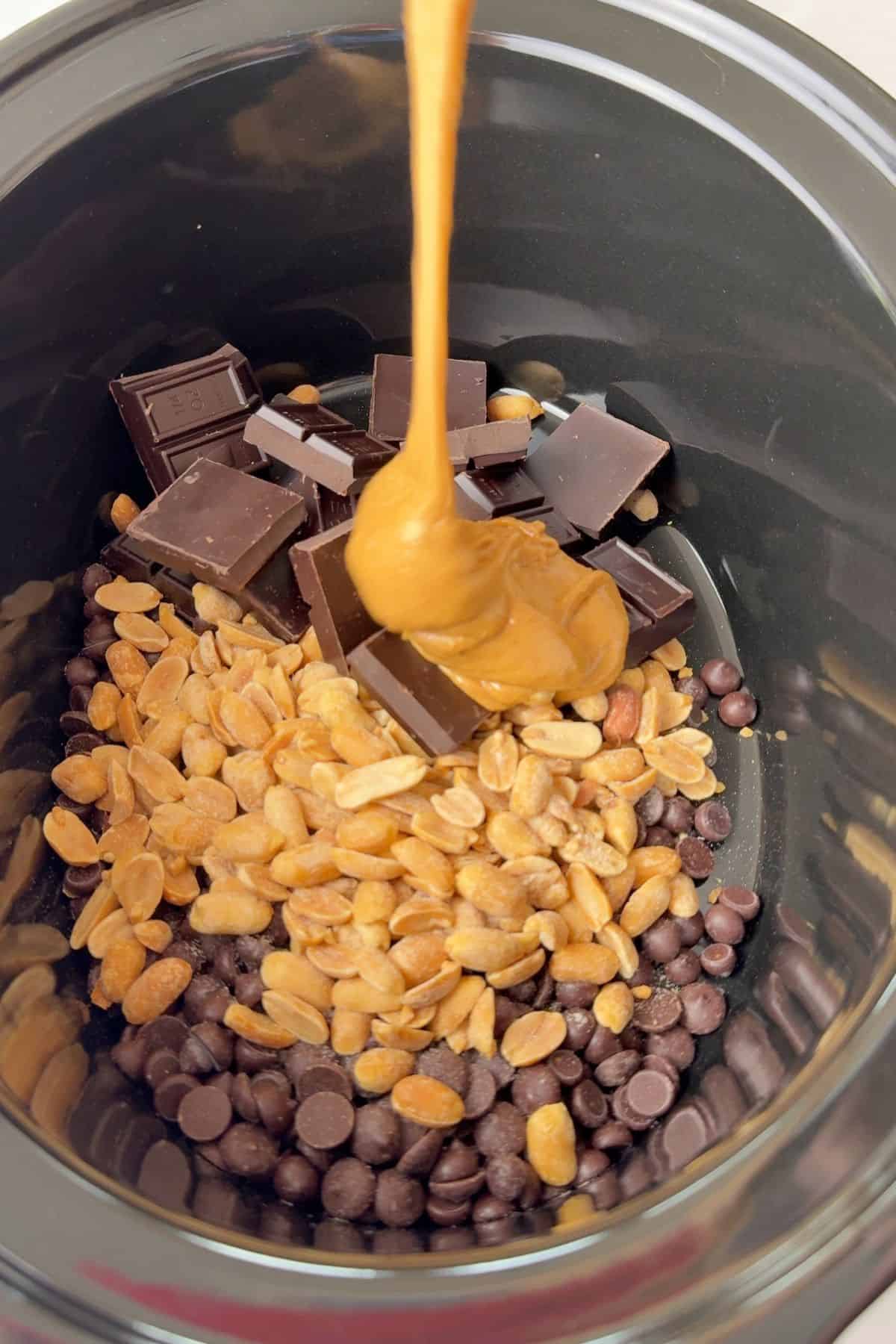 Adding the ingredients to the crockpot.