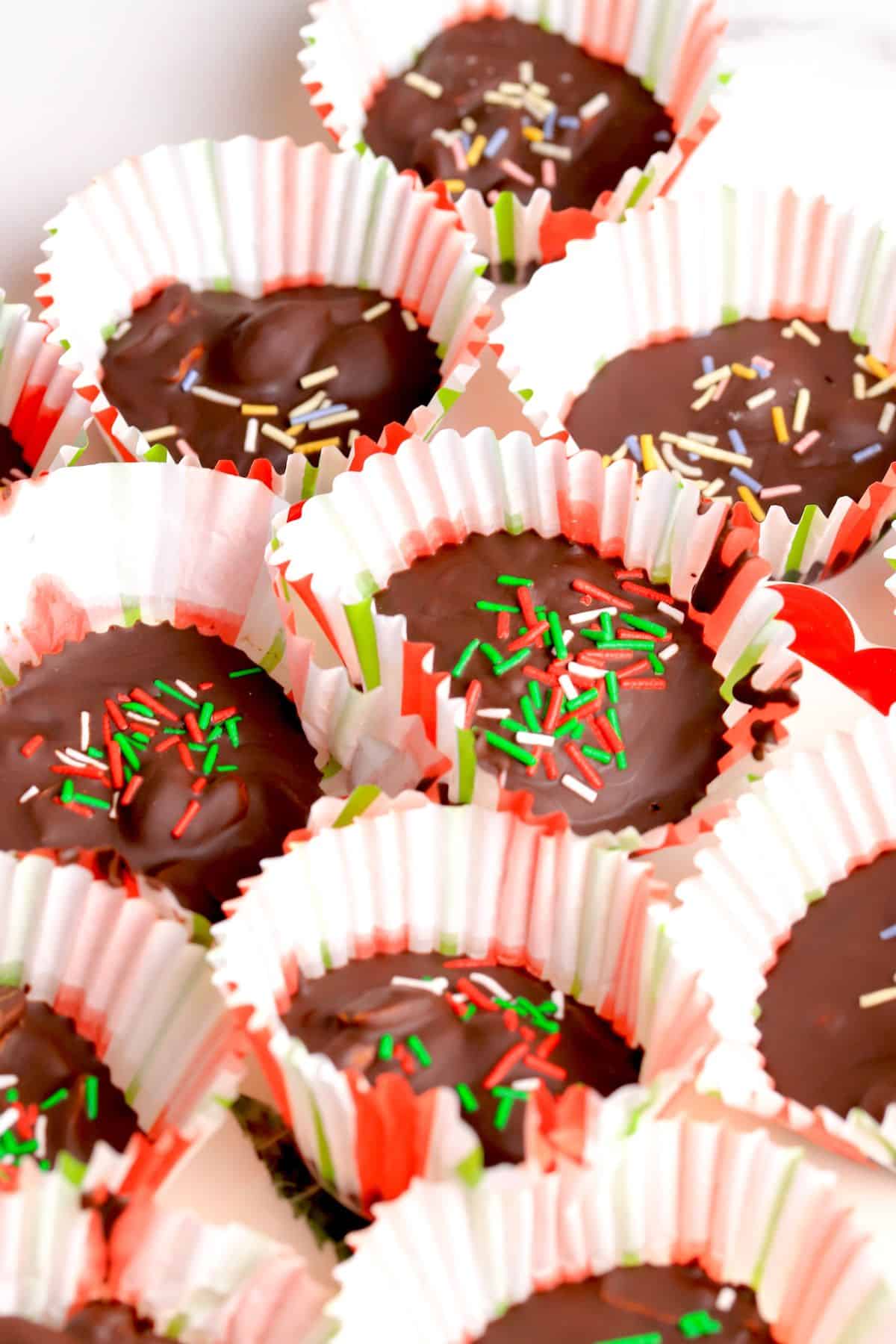 Low carb crockpot peanut clusters on a tray.