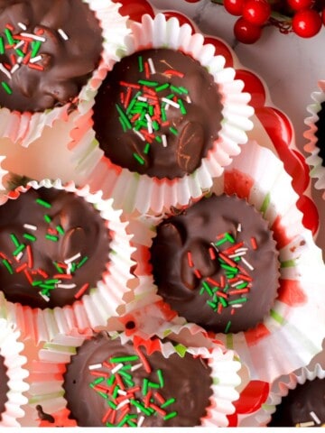 Low carb crockpot peanut clusters on a tray.