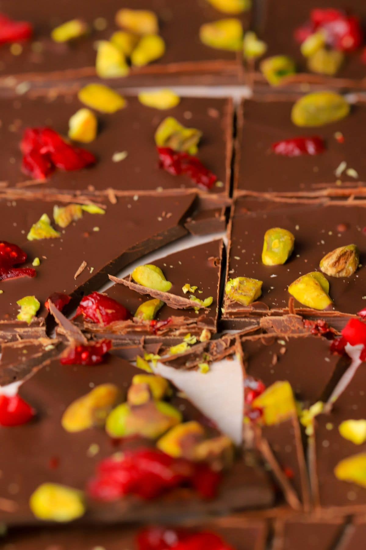 Low carb pistachio cranberry chocolate bark in pieces.