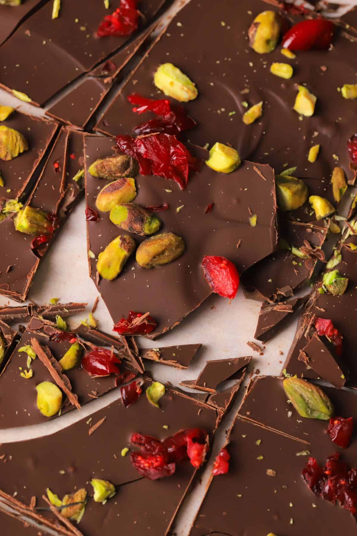Low carb pistachio cranberry chocolate bark in pieces.