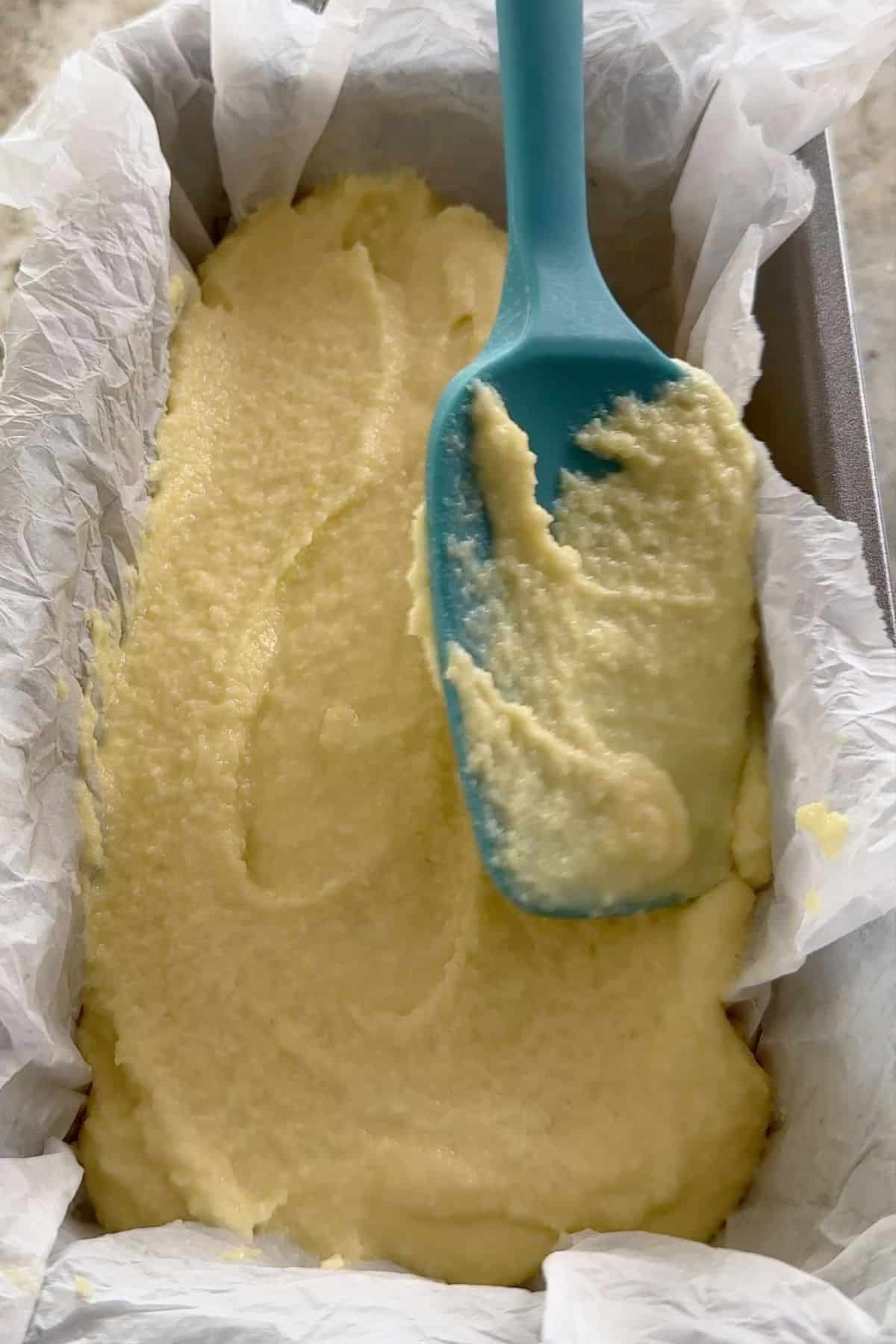 Lemon cake batter in the baking pan.