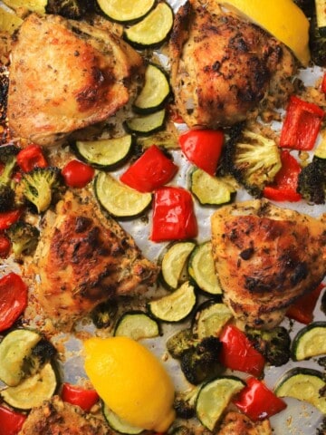 Low carb lemon garlic chicken with vegetables on a sheet pan.