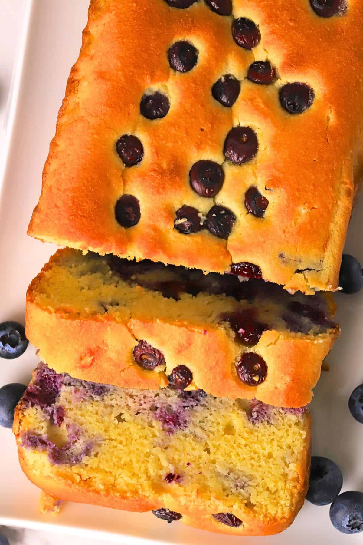 Low carb blueberry cottage cheese loaf cake on a platter.
