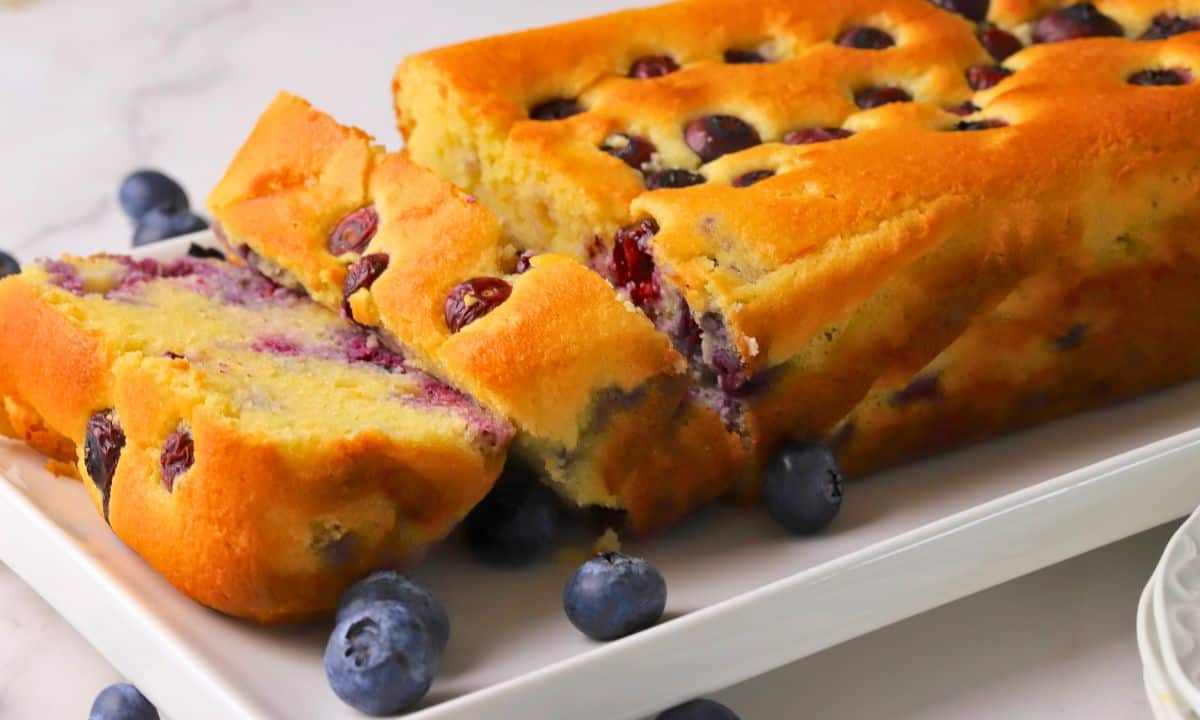 Low carb blueberry cottage cheese loaf cake on a platter.