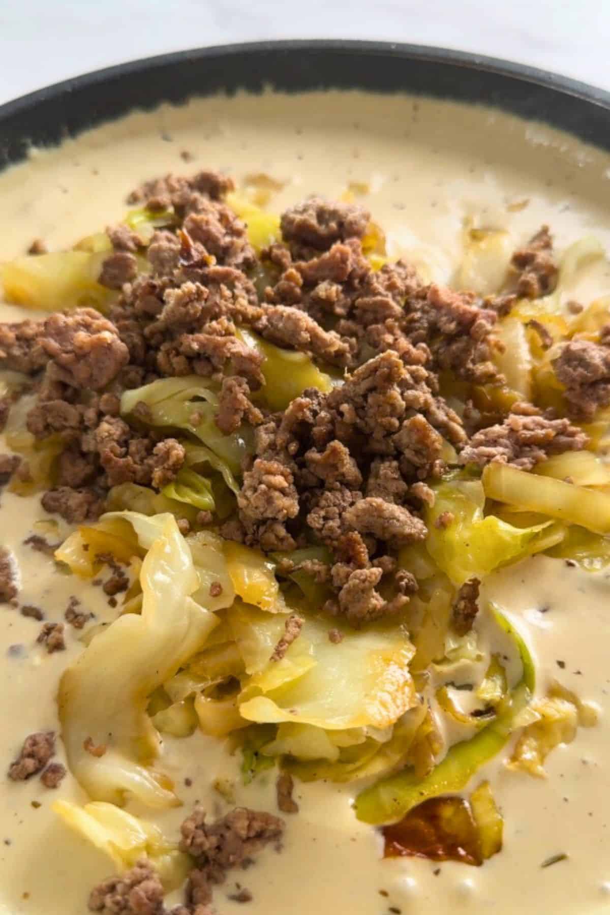 Low carb cabbage beef stroganoff in a skillet.
