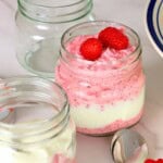 Low carb raspberry chia pudding in a mason jar.