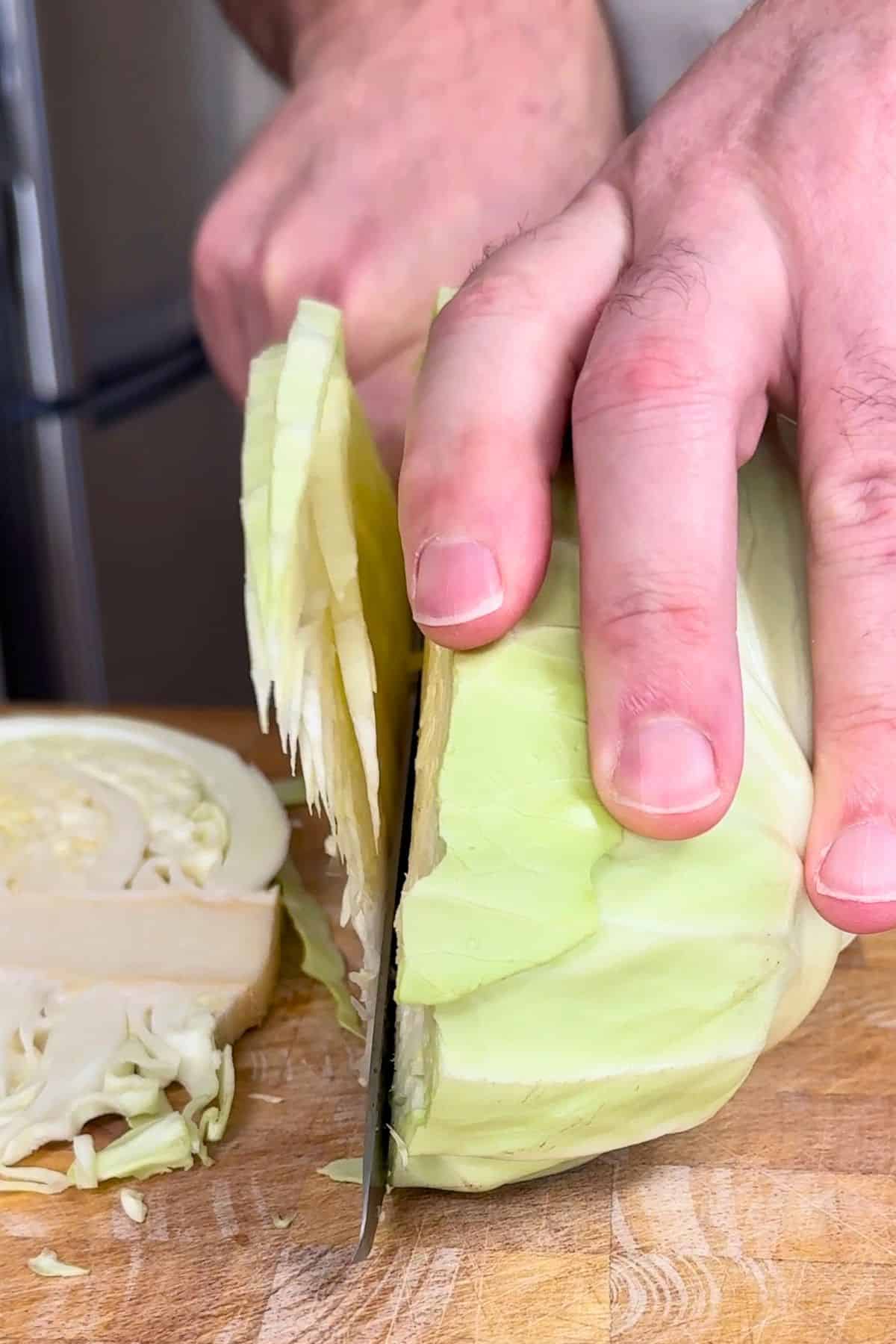 Slicing cabbage.
