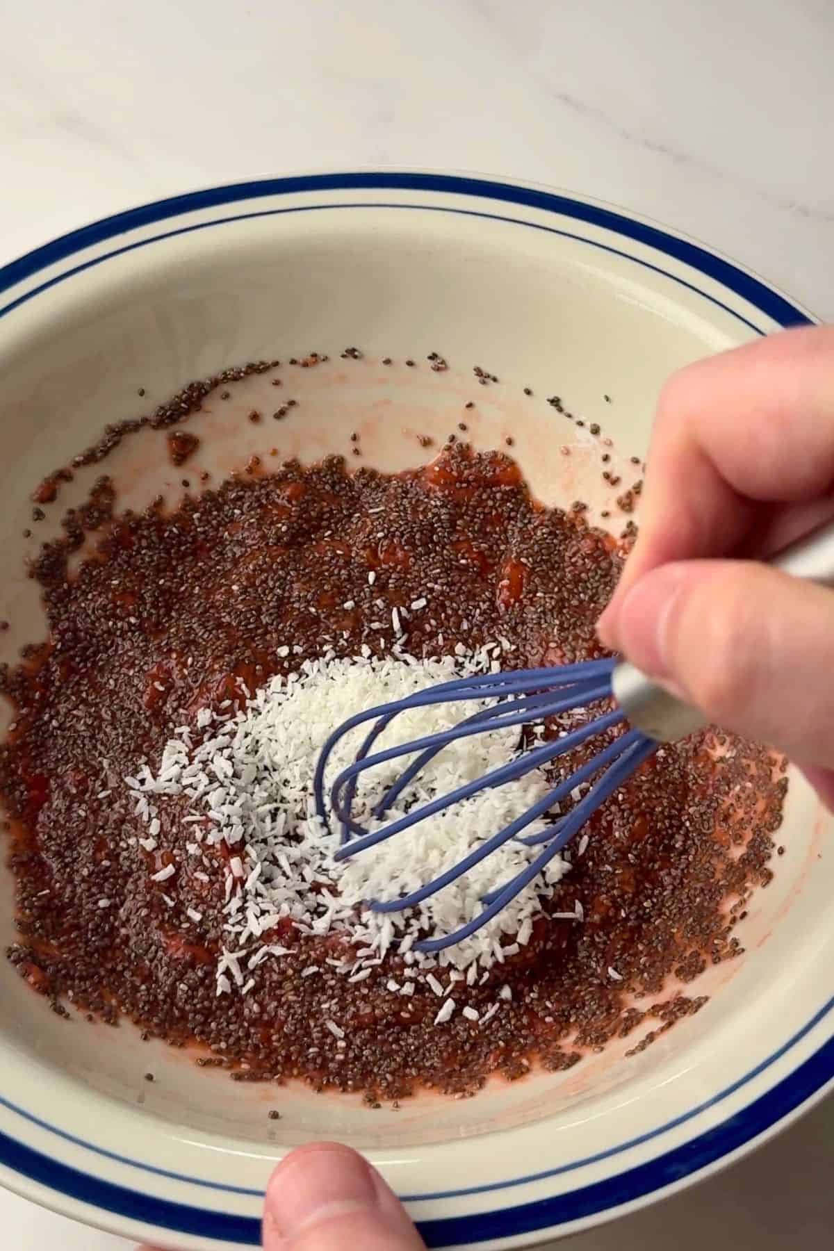 Whisking in the shredded coconut into the chia mixture.