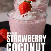 Two cups of low carb strawberry coconut chia pudding topped with strawberries pinterest image.