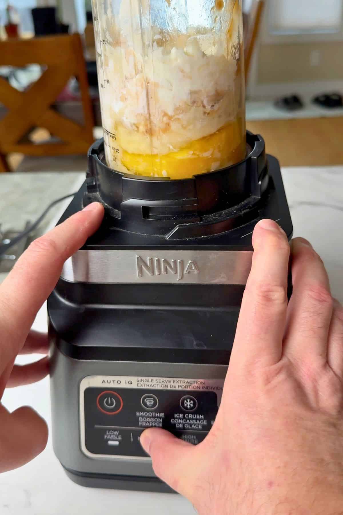 Blending the pancake batter in the blender.