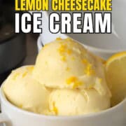 Low carb lemon ice cream in a bowl with a lemon slice.