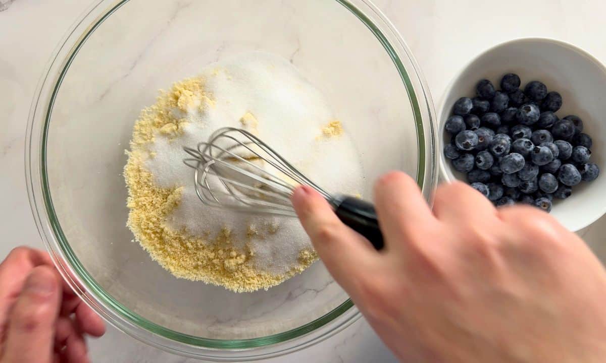 Whisking the dry ingredients in a bowl.